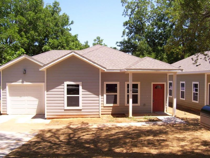 Single story home featuring a garage