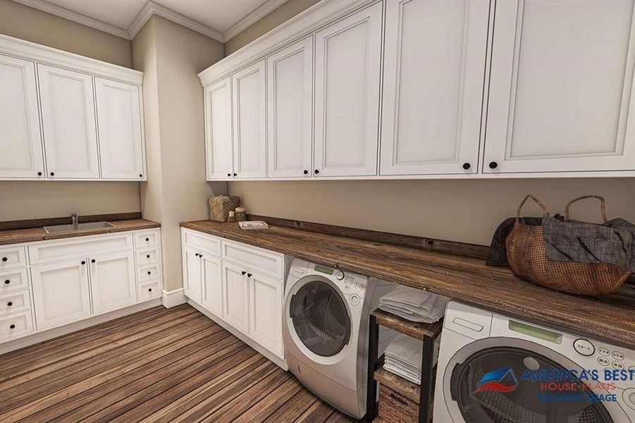 Washroom featuring crown molding, washer and dryer, cabinets, hardwood / wood-style flooring, and sink