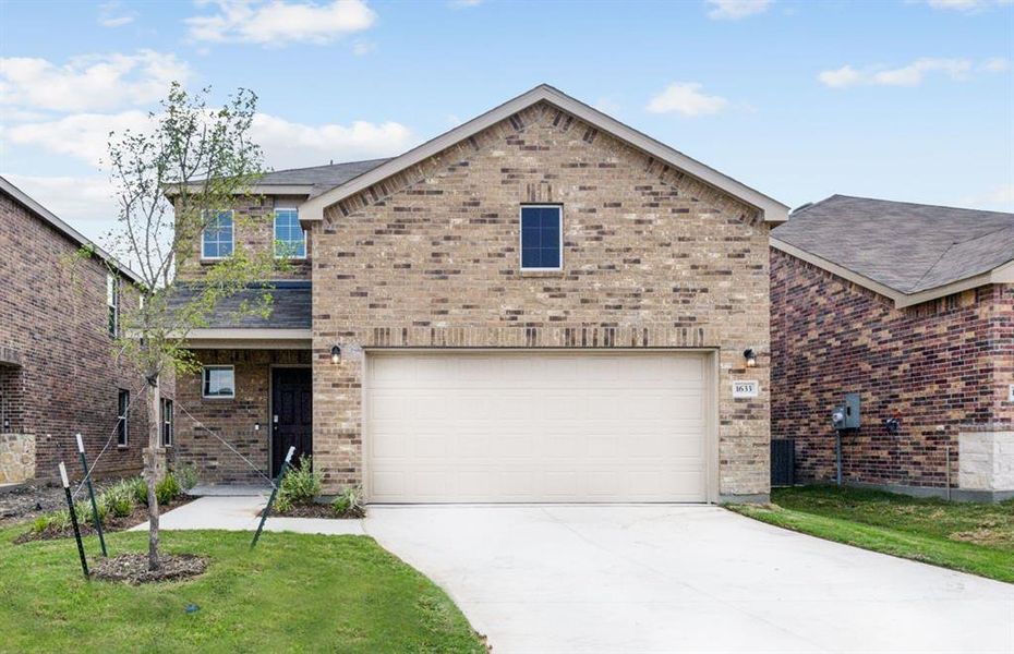 NEW CONSTRUCTION: Beautiful two-story beautiful home available at Travis Ranch in Forney