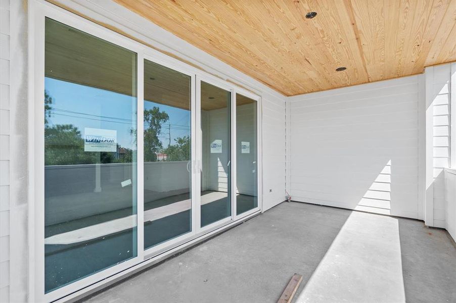 Covered balcony off the game room.