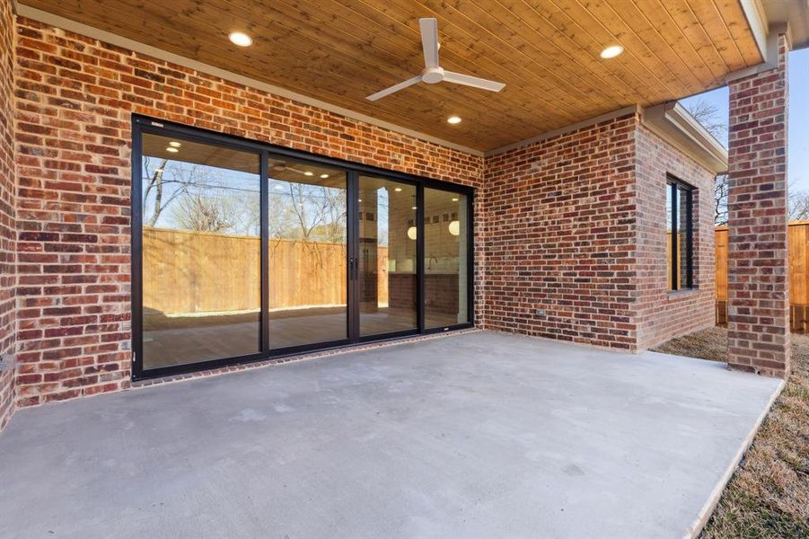 View of patio featuring ceiling fan perfect outdoor space