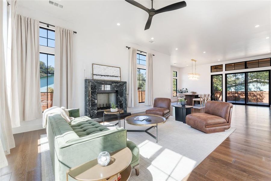 Bright, open living room with gorgeous fireplace