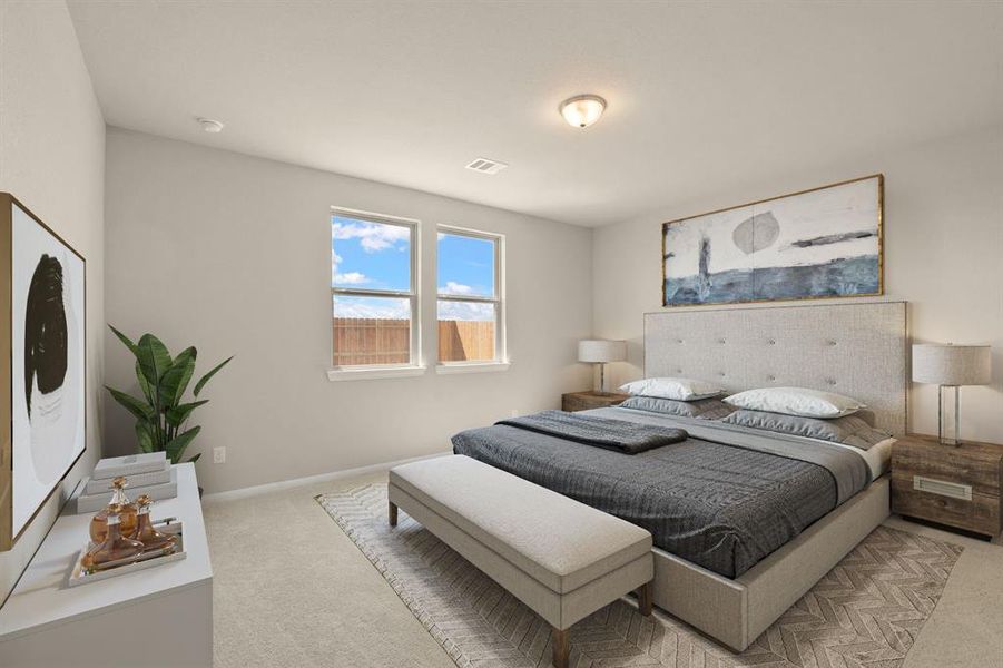 The primary bedroom is generously sized, creating a tranquil and spacious retreat that offers ample room for relaxation. Featuring plush carpet, high ceilings, fresh paint, and large windows that lets in natural lighting throughout the day.