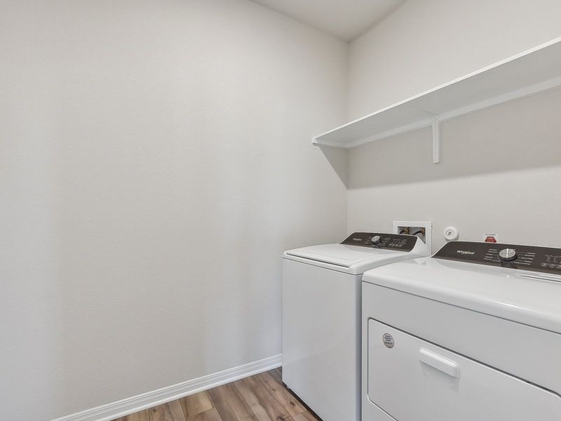 Make laundry day a breeze with this home's laundry room.