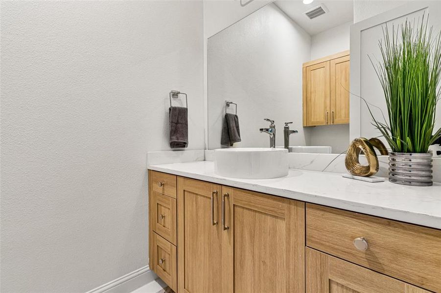 Bathroom featuring vanity