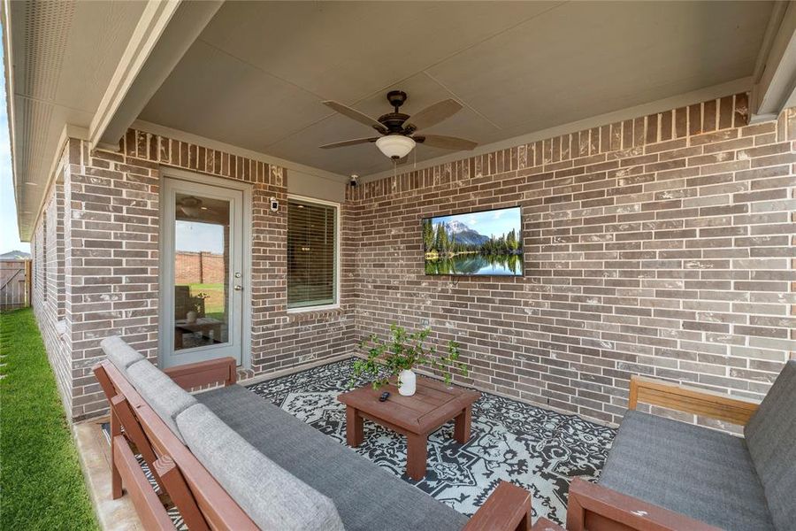 The covered patio is an easy place to sit back and watch the sunset or just get some you time in the fresh air.