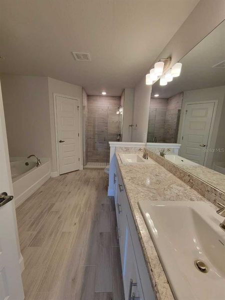 Home will have TILE ALL AREAS except bedrooms.  Picture of similar home for illustrative purposes only!  Colors and features will vary!