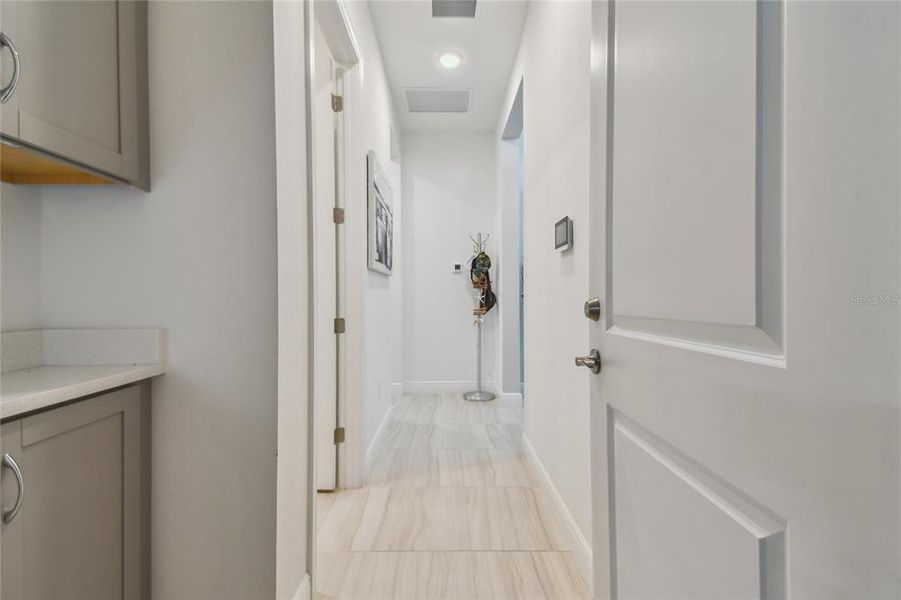 Laundry with built in cabinetry