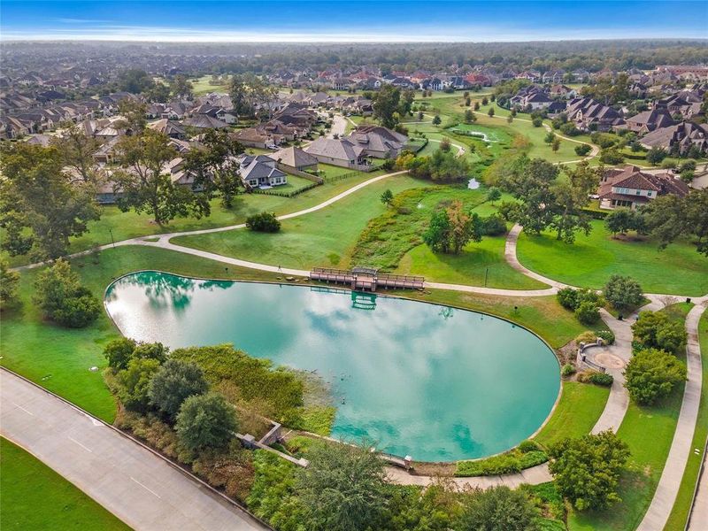 The subdivision features a picturesque lake, offering a serene escape right in your own neighborhood.