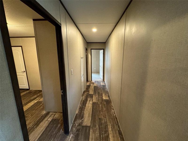 Hall featuring dark hardwood / wood-style floors