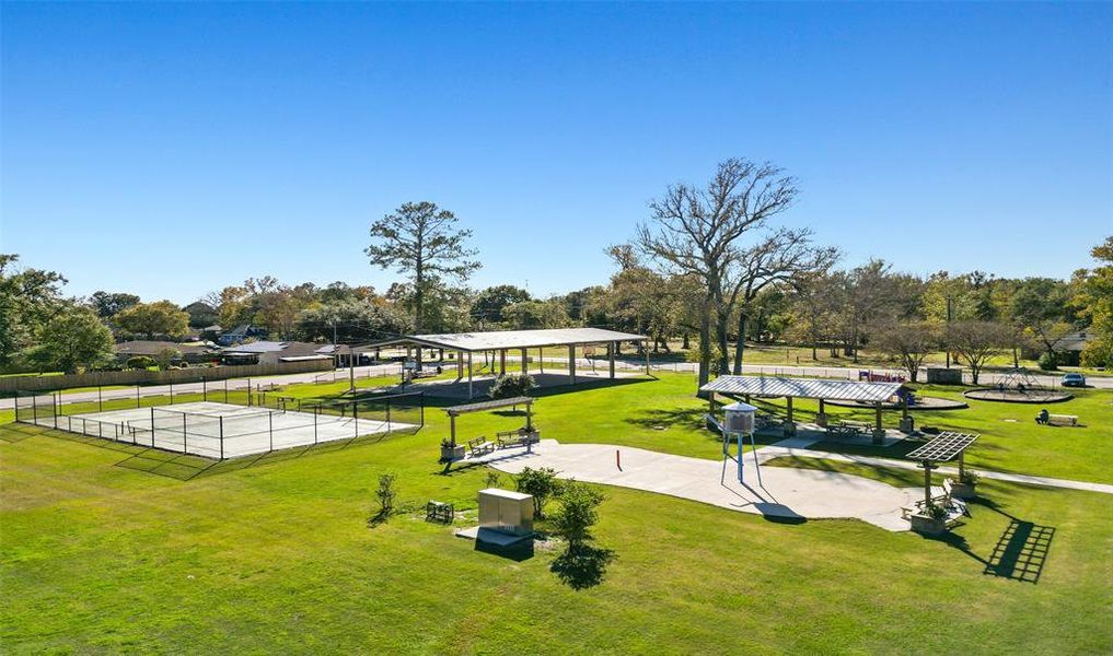 Parker Park offers basketball courts, a pavilion, picnic tables, playground, splashpad and tennis courts.