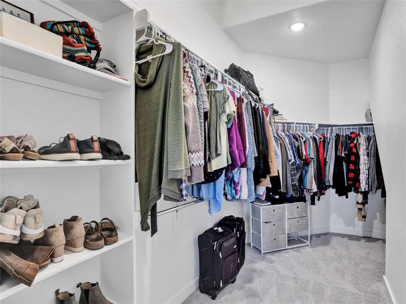 Huge walk-in closet with hidden storage space to the right!