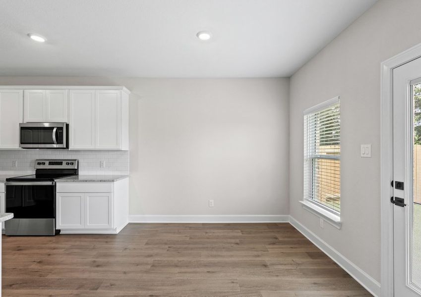 The dining room of the Cypress sits right off of the kitchen.