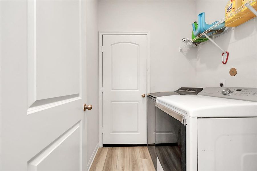 Utility room leading to the garage.