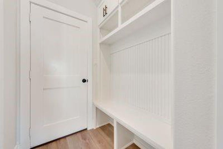 Mudroom featuring light hardwood / wood-style flooring