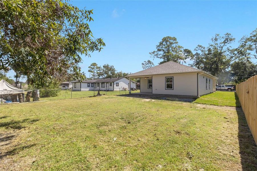 HUGE backyard with covered patio space