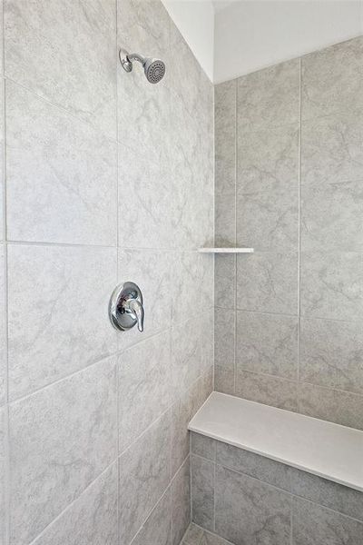 Bathroom with tiled shower