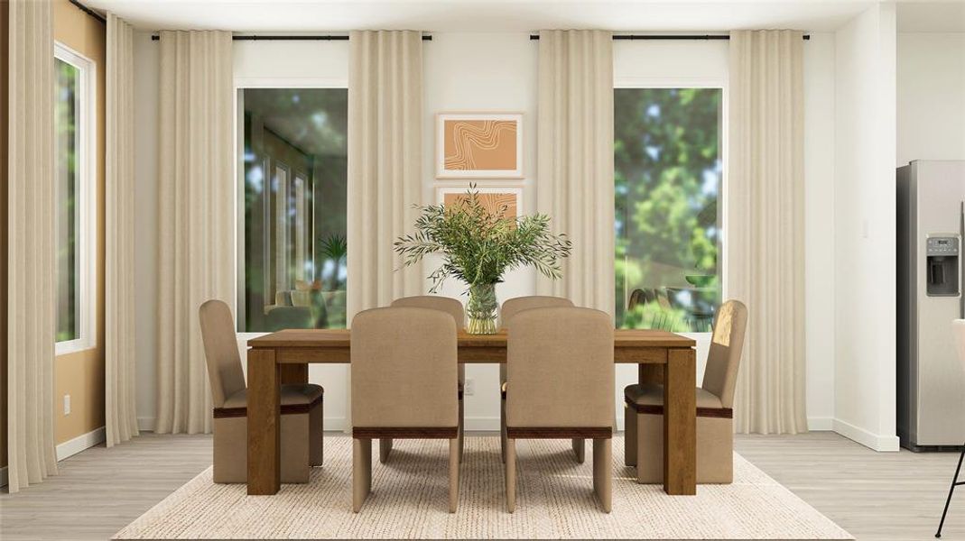 Dining space featuring light wood-type flooring