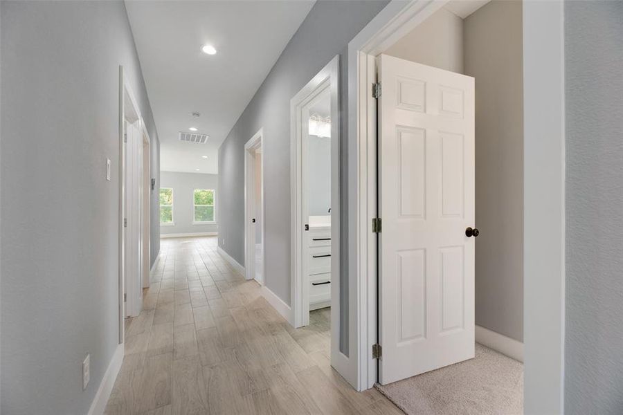 Hall with light wood-type flooring