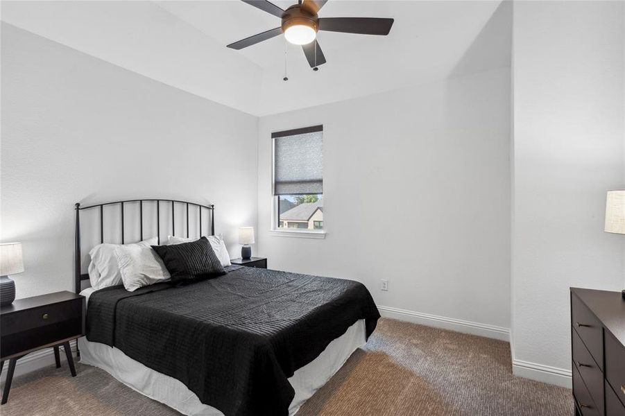 Secondary upstairs bedroom with walk in closet