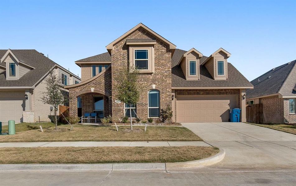 View of front of home with a garage