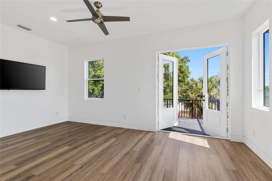 impact doors to back balcony with wood views