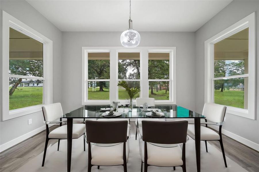 Virtually Staged - Large, bright dining area at 14.7 x 10.10