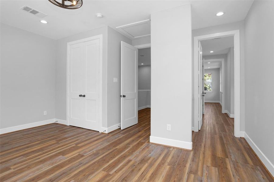 Second bedroom has walk-in closet, modern touches.