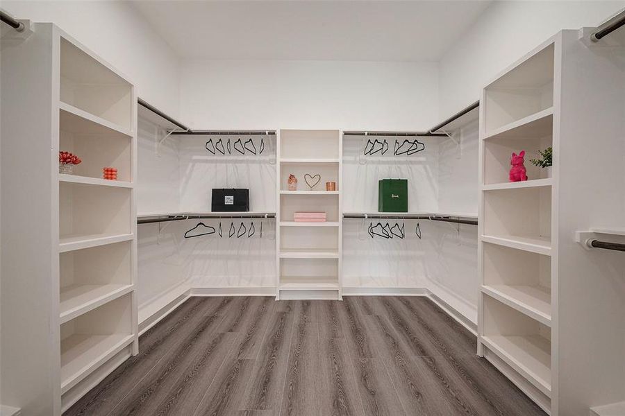 Primary Ensuite,spacious walk-in closet with plenty of shelves.