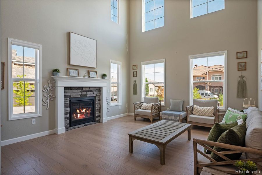 Large Great Room with Fireplace, Oversized windows, and Fireplace.