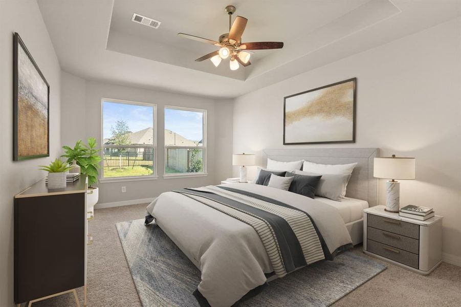 The primary bedroom is generously sized, creating a tranquil and spacious retreat that offers ample room for relaxation. Featuring plush carpet, high ceilings, fresh paint, and large windows that lets in natural lighting throughout the day.