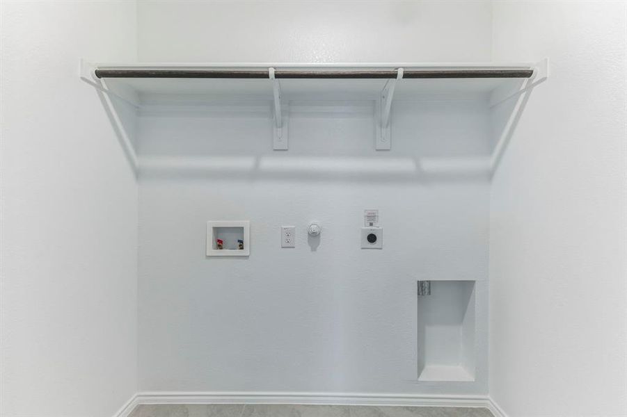 Washroom featuring hookup for an electric dryer, gas dryer hookup, and washer hookup