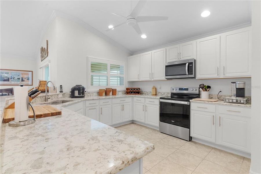 Large Bright Kitchen with Upgraded Quartz.