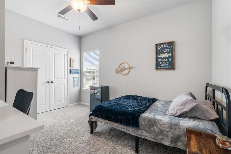 Second bedroom is upstairs with ceiling fan and large closet!