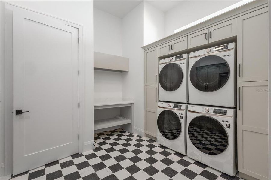 Laundry Room on 1st floor- with 2 washers and 2 dryers