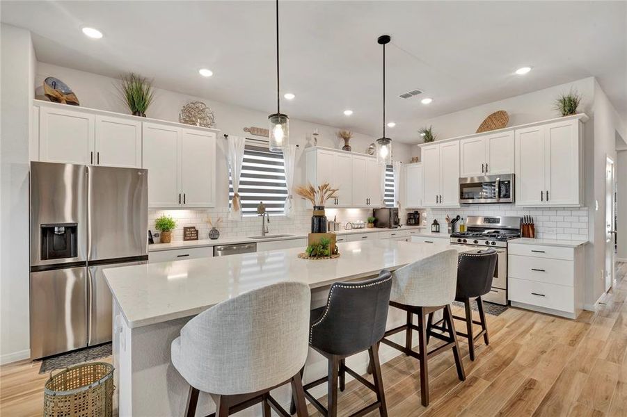 Complete Culinary Haven - Featuring a beautiful design and functionality that make this kitchen a chef's dream. Stove, microwave, and dishwasher included!