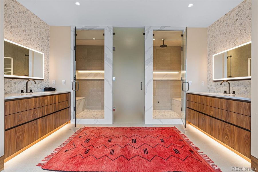 Two separate showers (one equipped with steam), beautiful Shiloh Cabinetry and Pental Quartz Slab counters, Wetstyle Undermount Sinks, Venezia Sink Faucets, Nostromo Shower Heads, Venezia Hand Shower, and a Neorest Dual Flush Smart Toilet bidet.