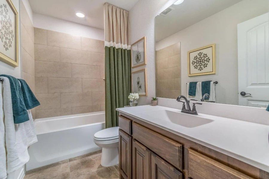 Bath | Concept 2379 at Abe's Landing in Granbury, TX by Landsea Homes