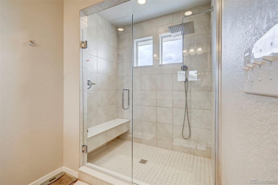 Luxurious shower in the primary bathroom.