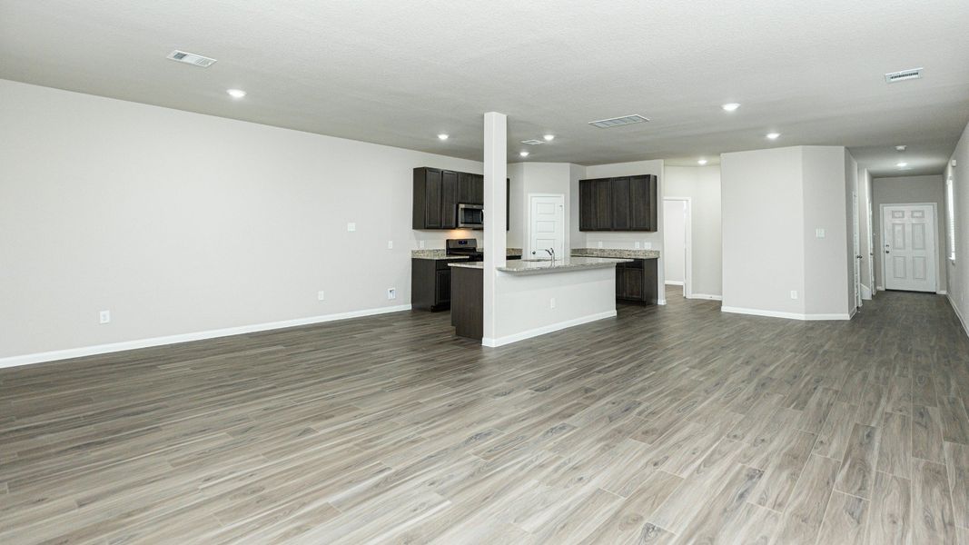 Family Room to Dining Area and Kitchen