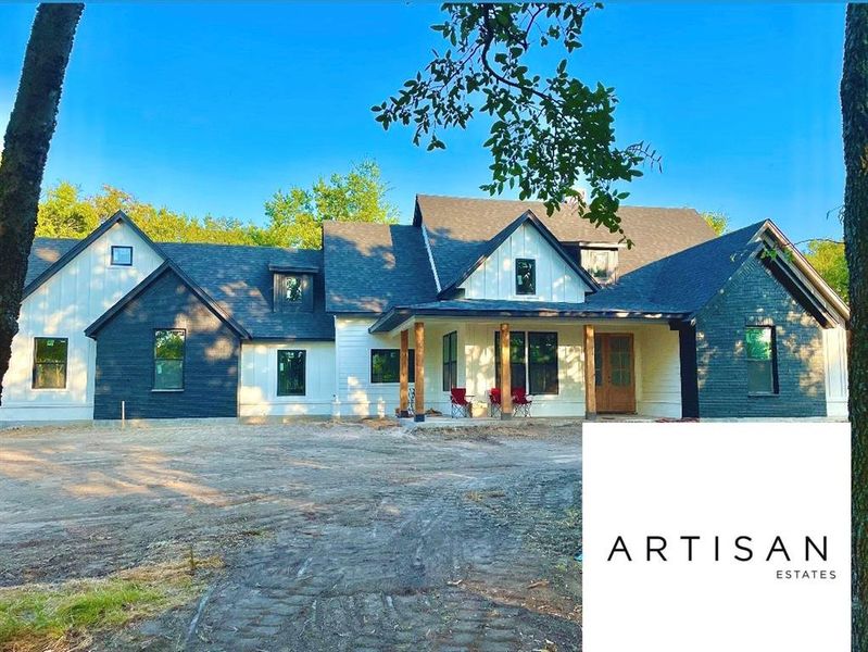 Modern farmhouse style home featuring a porch