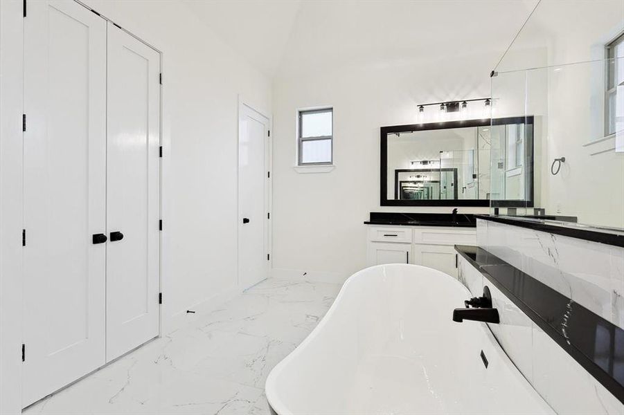 Bathroom with independent shower and bath and vanity