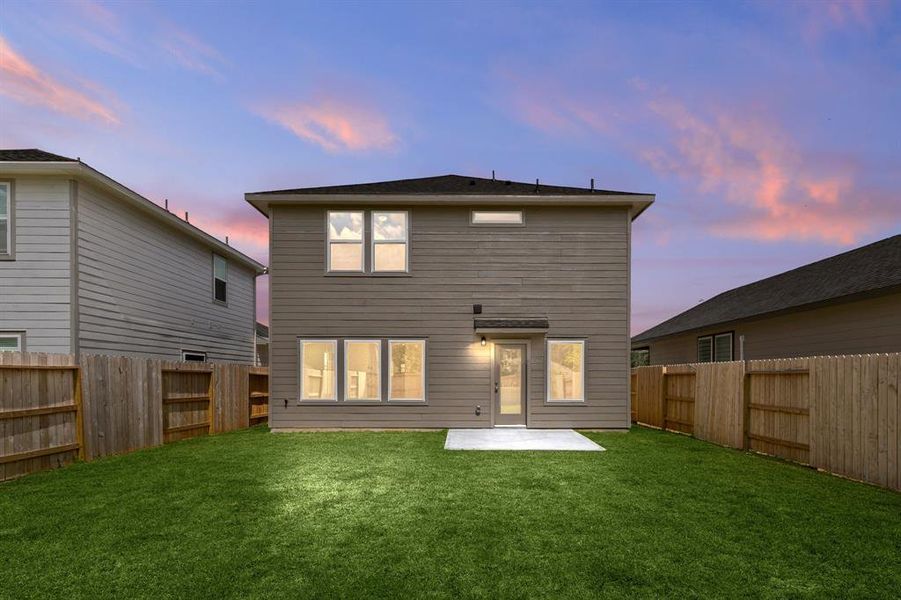 Come and see this spacious backyard with plenty of room for the kids to play and adults to relax!