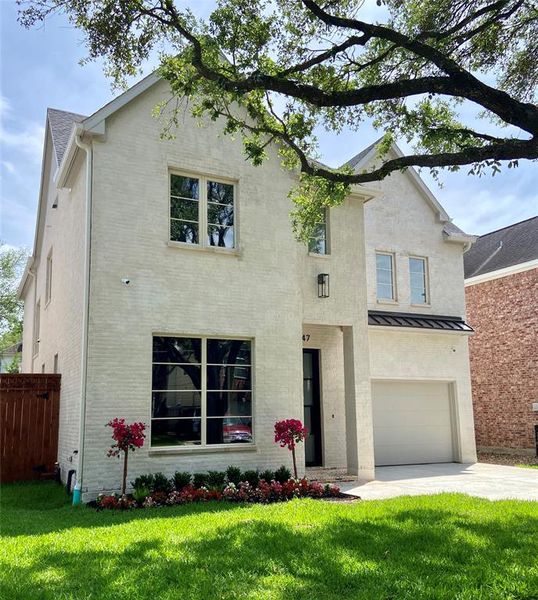 Gorgeous Oak tree graces front yard