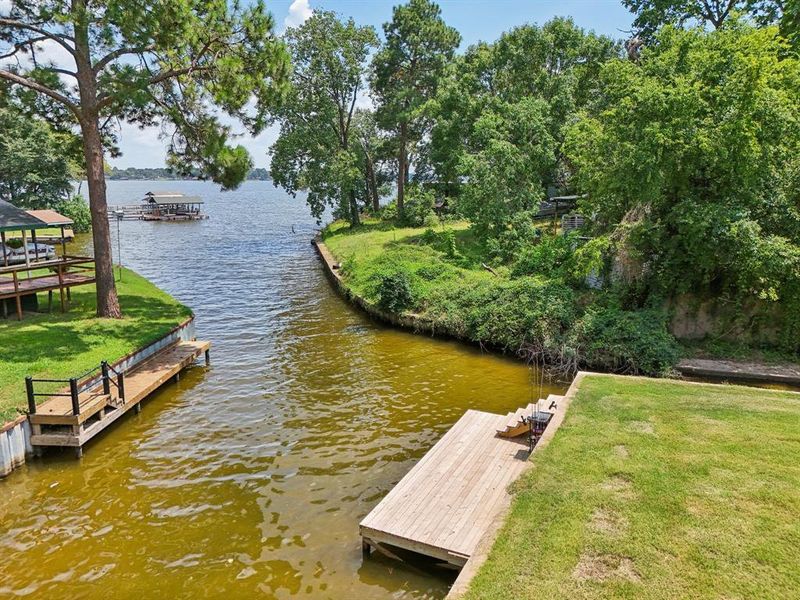 Dock area featuring a water view