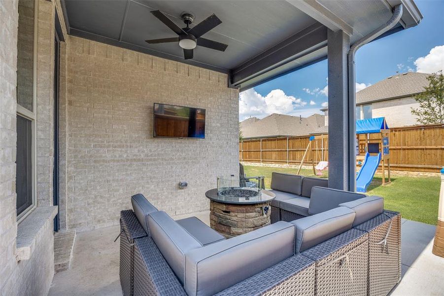 View of patio with ceiling fan