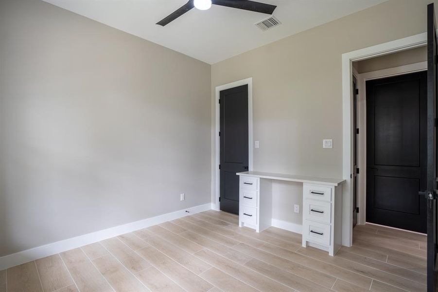 This bedrooms features a desk or vanity area. All of the bedrooms have walk-in closets!