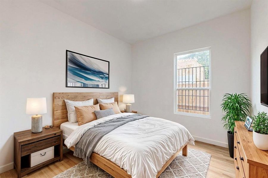 Bedroom with light wood-type flooring