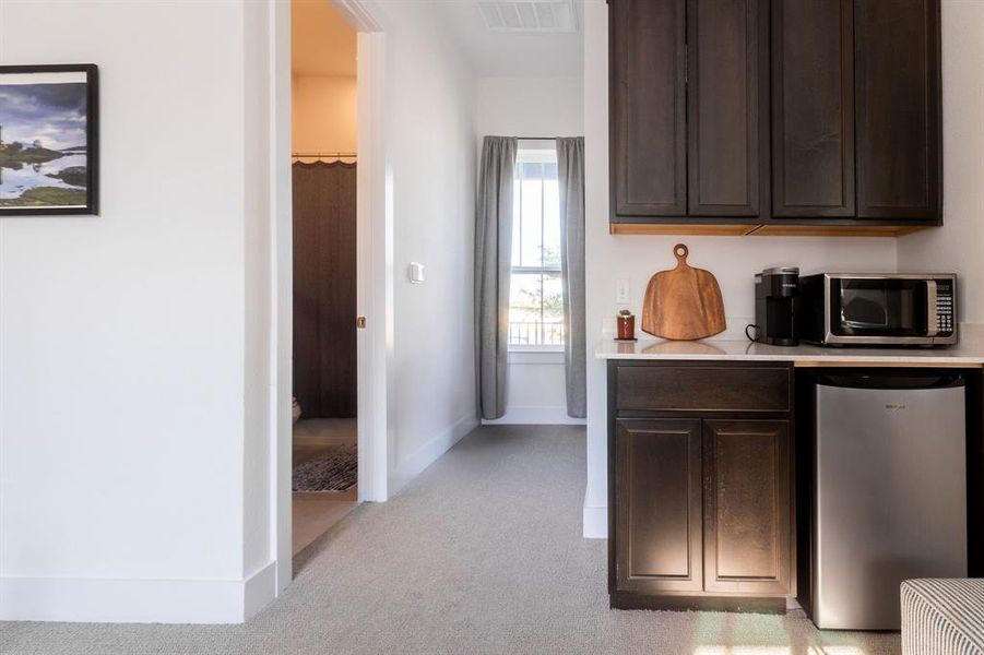 Full bath, large closet and kitchenette to your left. Mini refrigerator conveys.