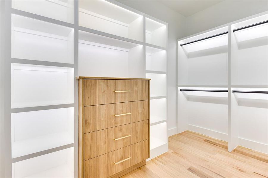 Walk in closet featuring wood-type flooring